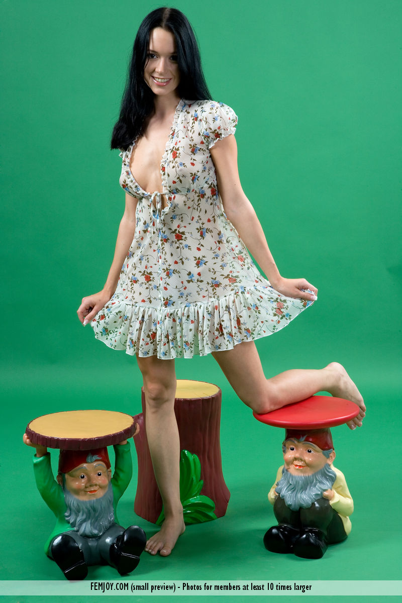 Dark haired girl Gwen models totally naked amid Garden Gnomes porn photo #426714036