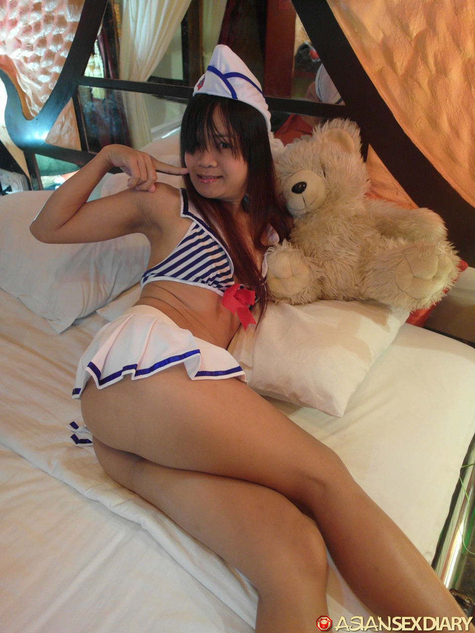 This cute little Japanese amateur, Maki has his face covered by cum after POV sex.
