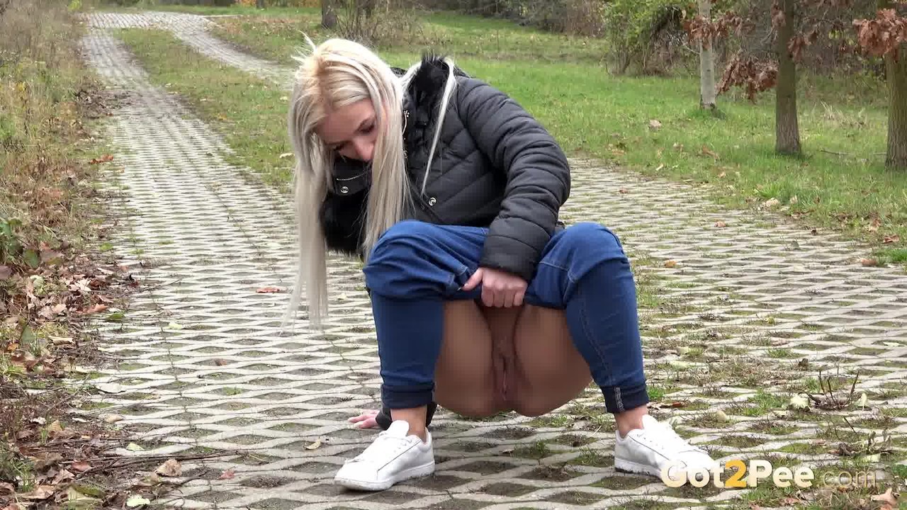 Blonde European pisses on a path on a trail порно фото #424748128