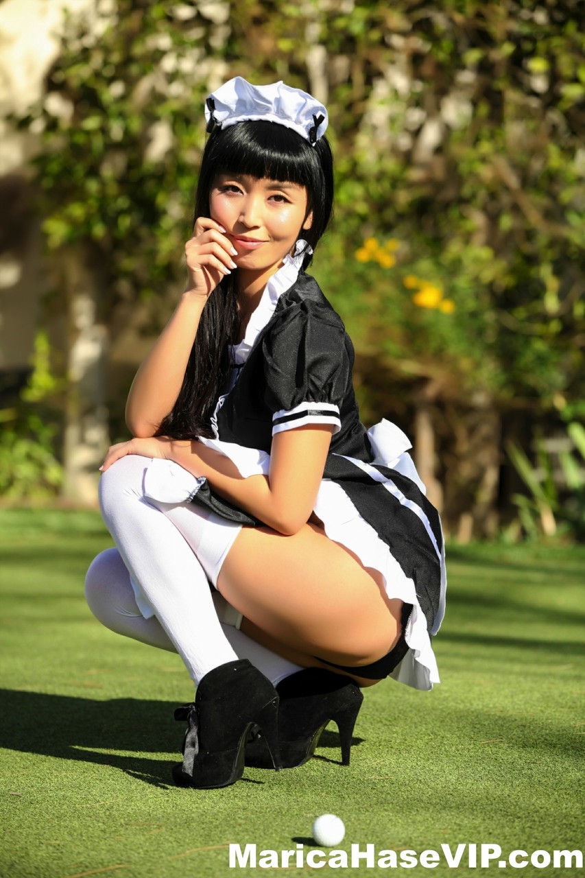 Japanese Maid Marica Hase Exposes Her Tits And Twat On A Putting Green