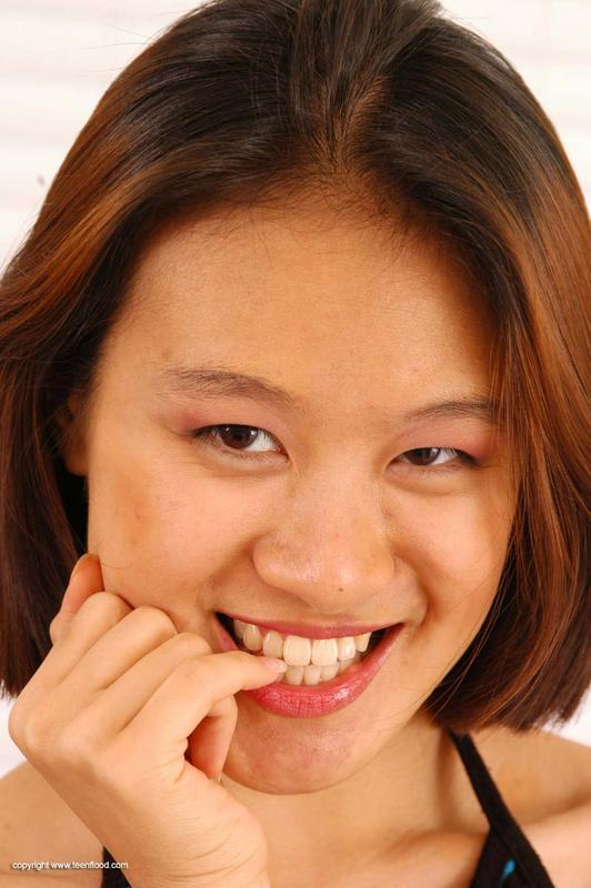 Asian teen May strips totally naked prior to a finger fuck