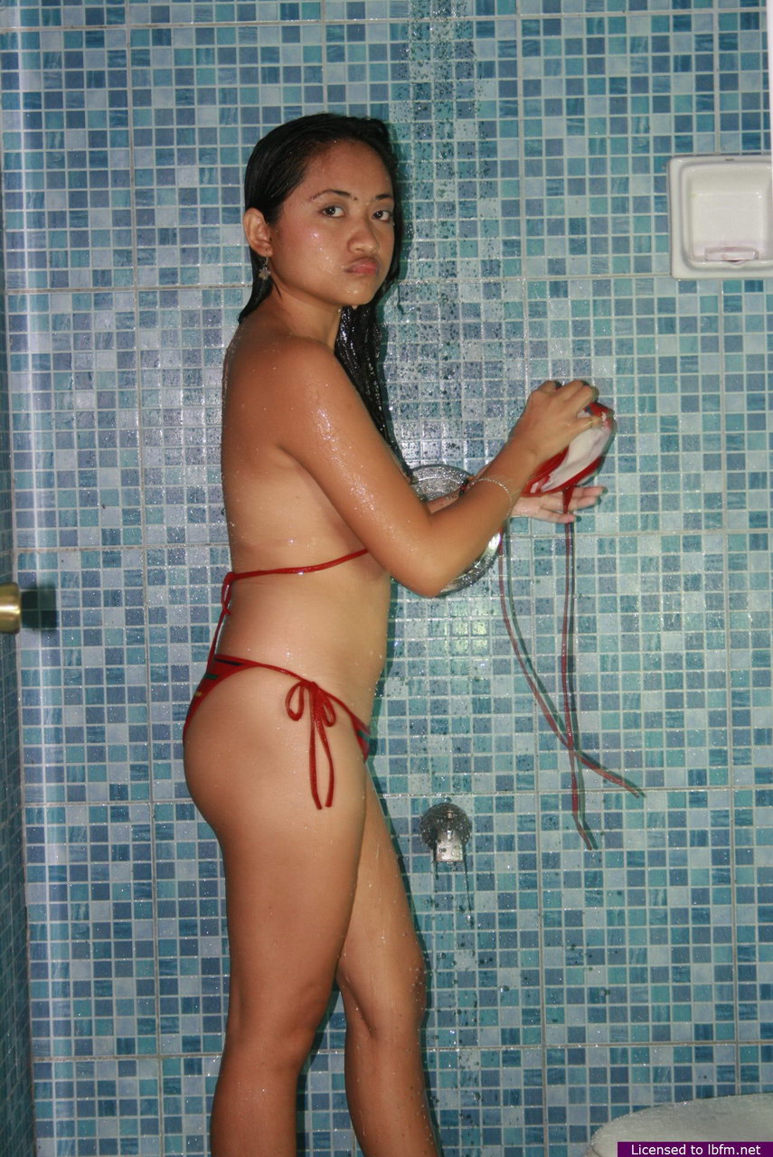 Asian Teen Masturbates With A Sex Toy In A Bathroom After Showering