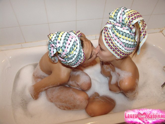 Teen lesbians Katrina and Laura wears towels on heads while taking a bath porn photo #424987960
