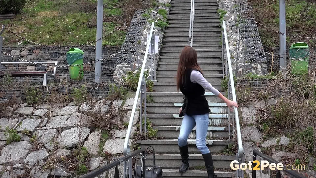 Sexy brunette babe pisses in public on some steps porno foto #429124809