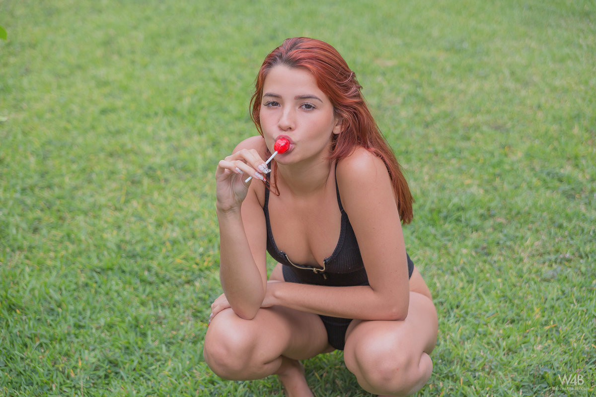 Sexy redhead Agatha Vega sucks a sucker before squirting while masturbating porn photo #426863965