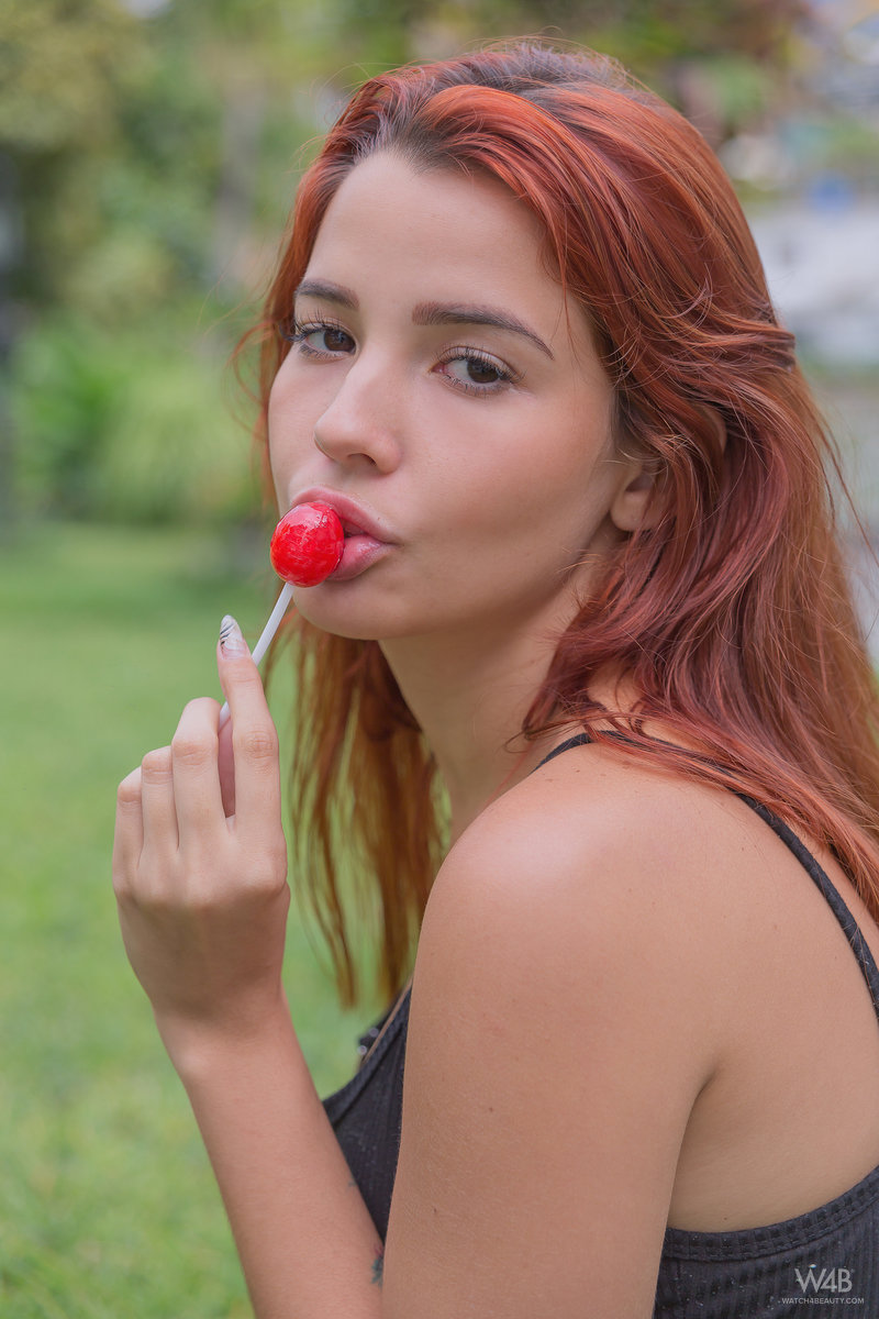 Sexy redhead Agatha Vega sucks a sucker before squirting while masturbating Porno-Foto #426863973