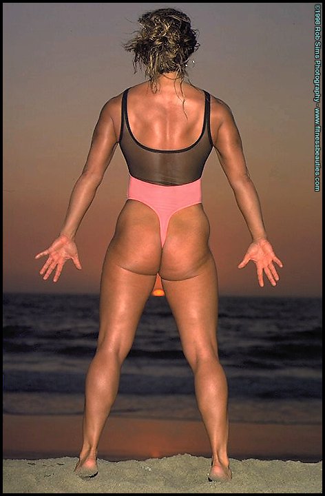 Bodybuilder Kelly Oreilly models swimwear when not pumping iron on a beach ポルノ写真 #426887131