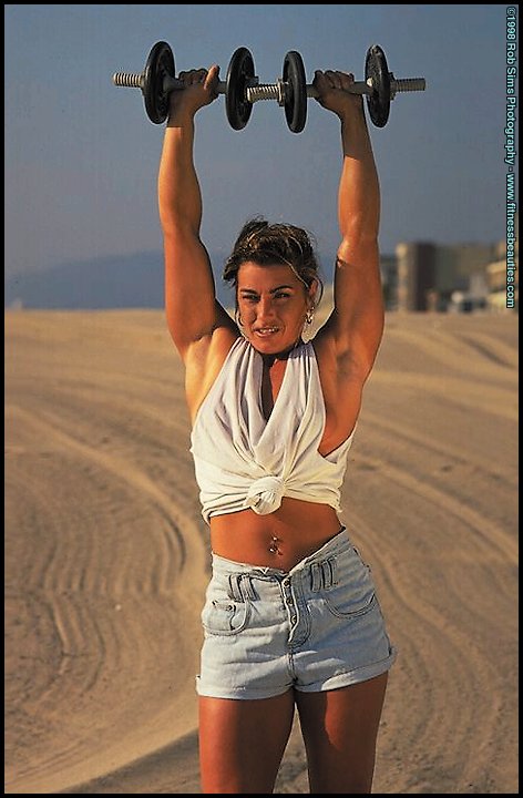Bodybuilder Kelly Oreilly models swimwear when not pumping iron on a beach ポルノ写真 #426887170