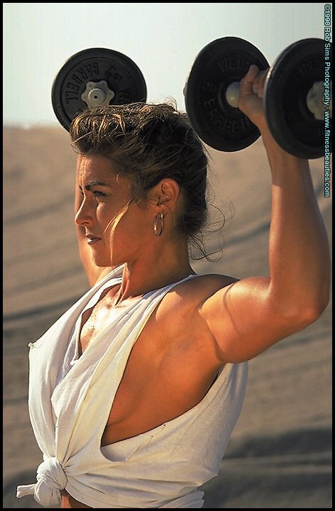 Bodybuilder Kelly Oreilly models swimwear when not pumping iron on a beach ポルノ写真 #426887172
