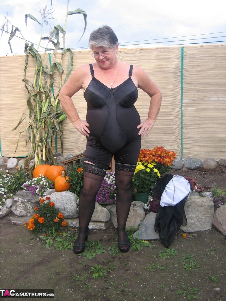 Fat Nan Girdle Goddess Sets Her Saggy Boobs Free Of A Girdle In The Backyard