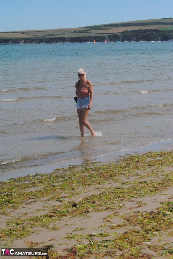 Mature granny Dimonty skinny dipping at the beach with big saggy tits hanging foto porno #423889878