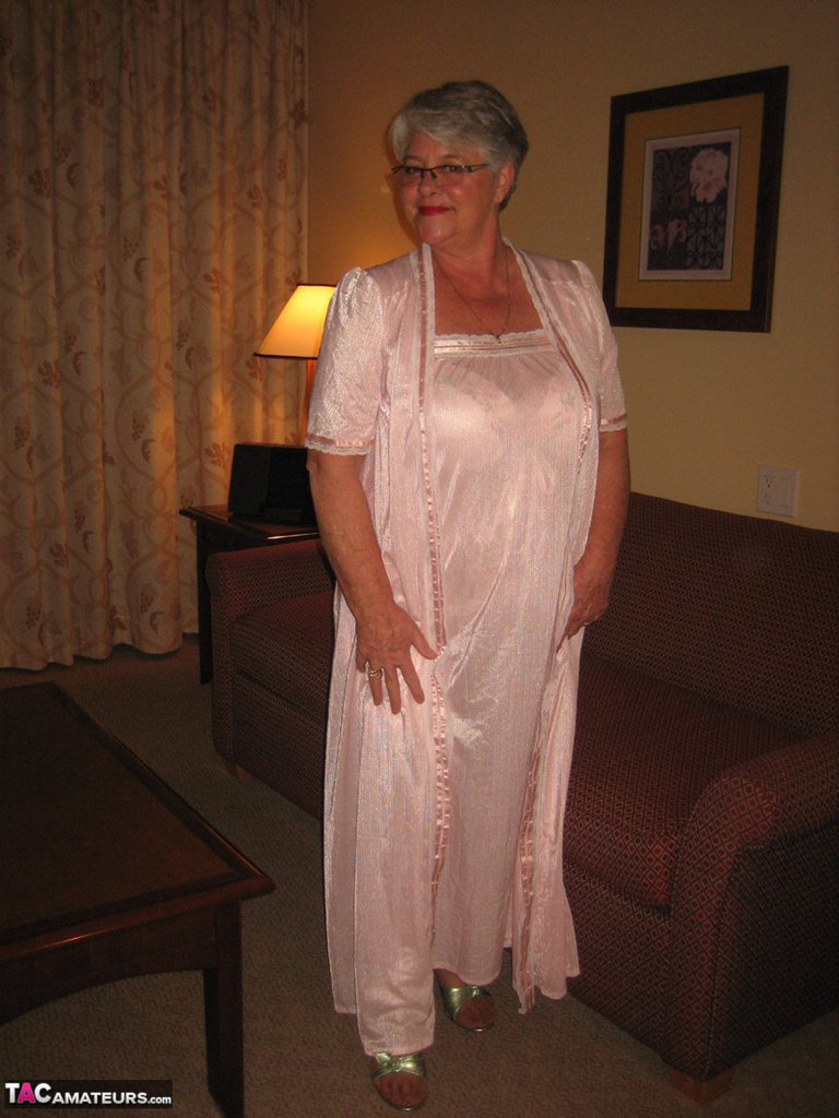 Amateur granny on the heavy side shows her pussy in lingerie and tan nylons porn photo #428616242