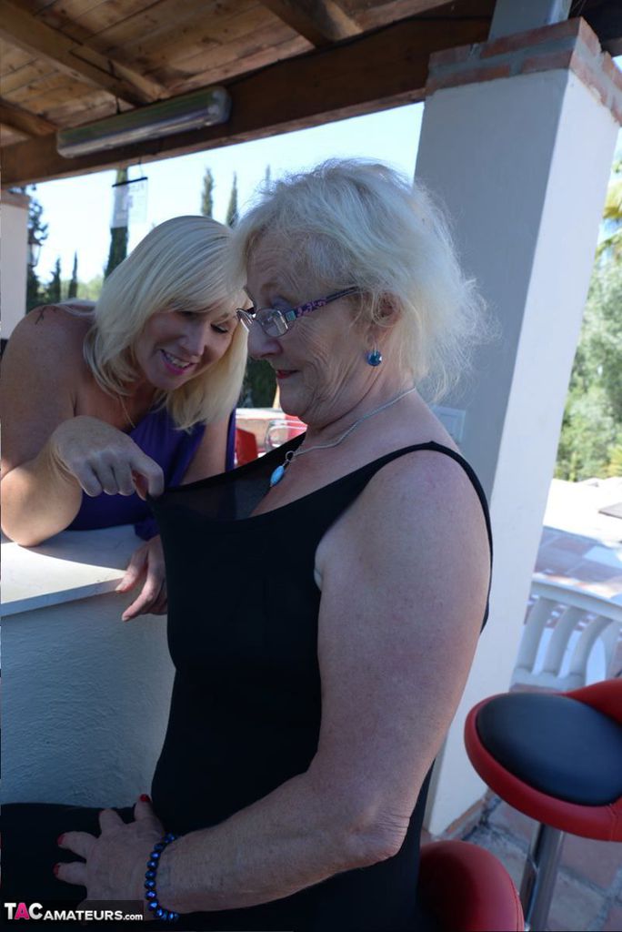 Old women share a lesbian kiss after drinking to much wine out on the patio porn photo #425918836 | TAC Amateurs Pics, Melody Charm, Granny, mobile porn