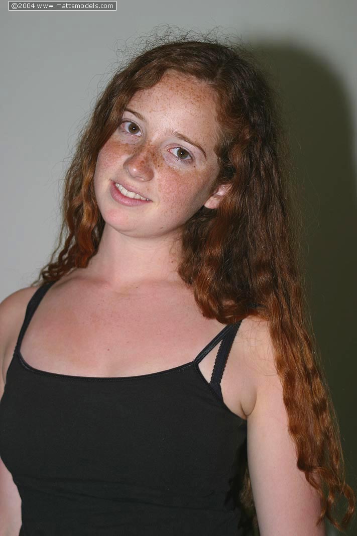 Redhead With Freckles And Big Tits Parts Her Natural Pussy After Getting Naked