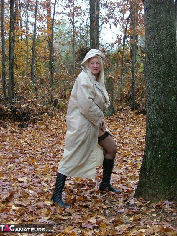 Adonna, the older and fatty blonde woman who is more conventional in her age, exposes her fake tits and steals them while playing in the woods.