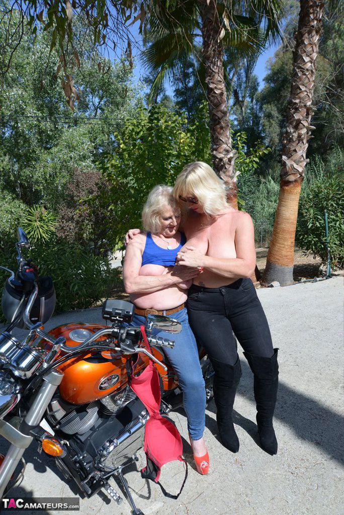 Older blonde lesbians go topless outdoors on a motorcycle porno fotoğrafı #426472767