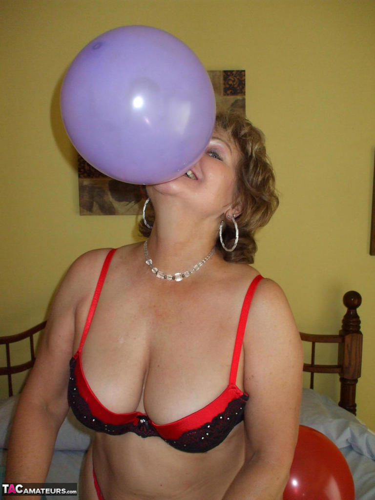 Older Lady Busty Bliss Plays With Balloons Before Uncupping Her Natural Tits