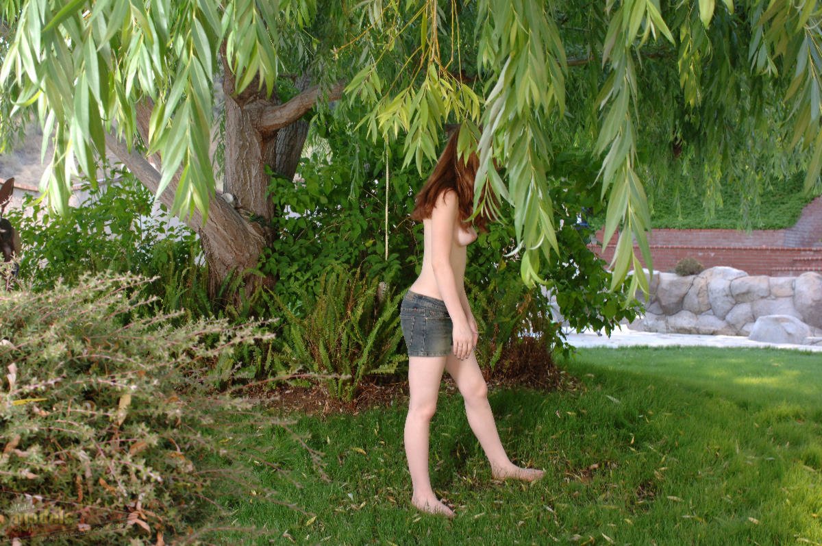 Redhead amateur Ruby Flame touts her bald twat after getting naked in a yard porno fotoğrafı #427034666