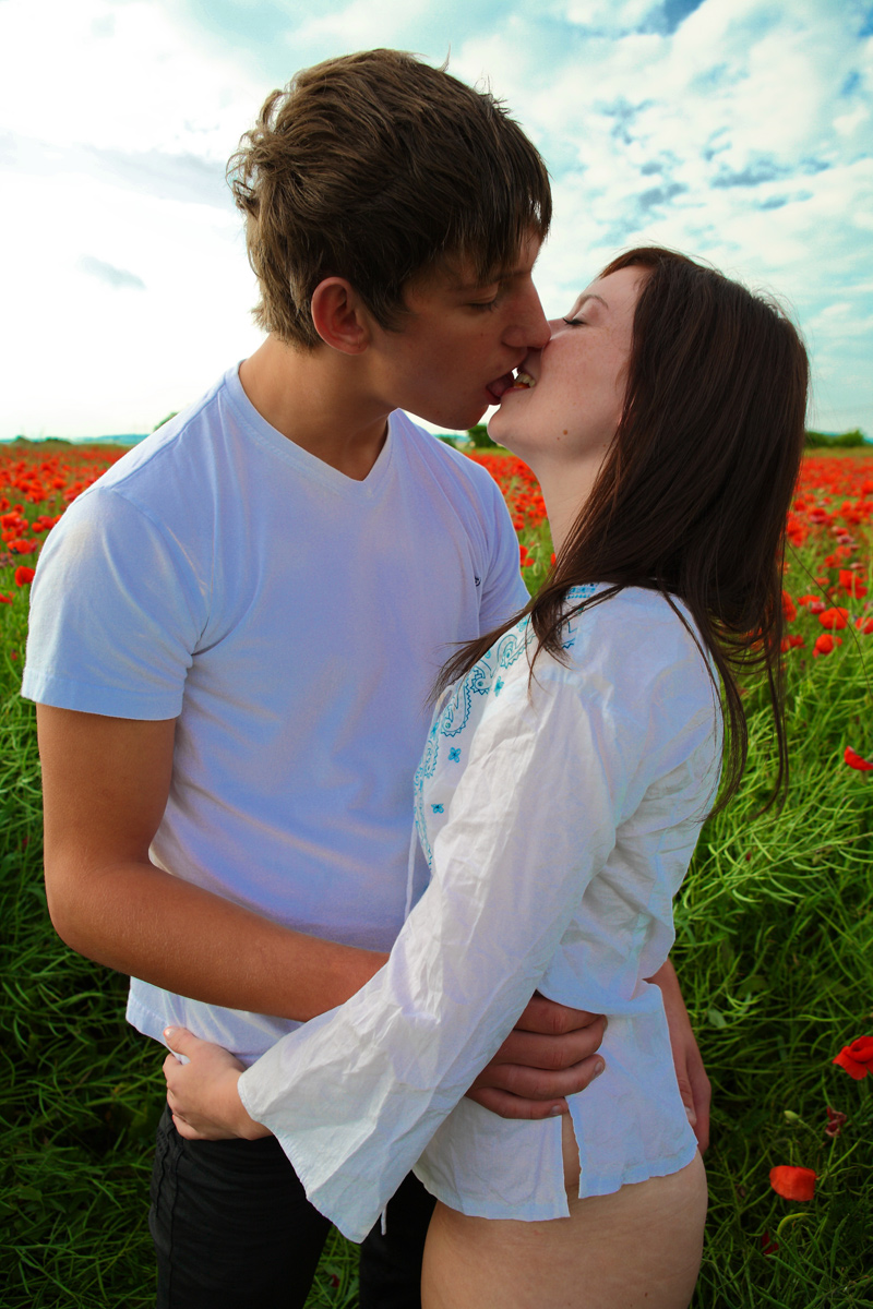 Young couple engages in hardcore sex while in a field of poppies porn photo #428768484