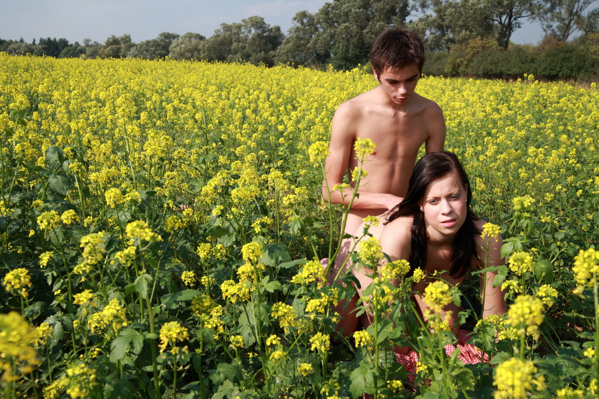 In the middle of this field of flowers, this teen has her tender pussy porn photo #424707705