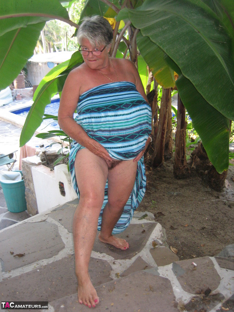 Old woman Girdle Goddess smokes before exposing her fat body on her patio foto porno #429088077