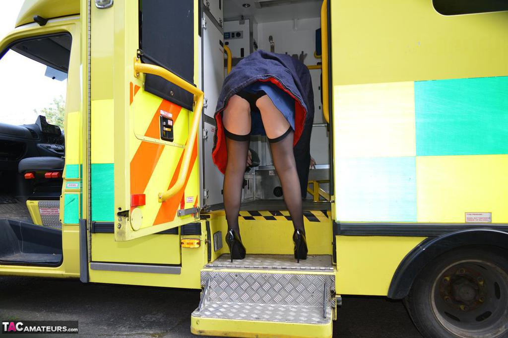 Older blonde nurse Barby Slut gives a blowjob inside an ambulance porn photo #425270052