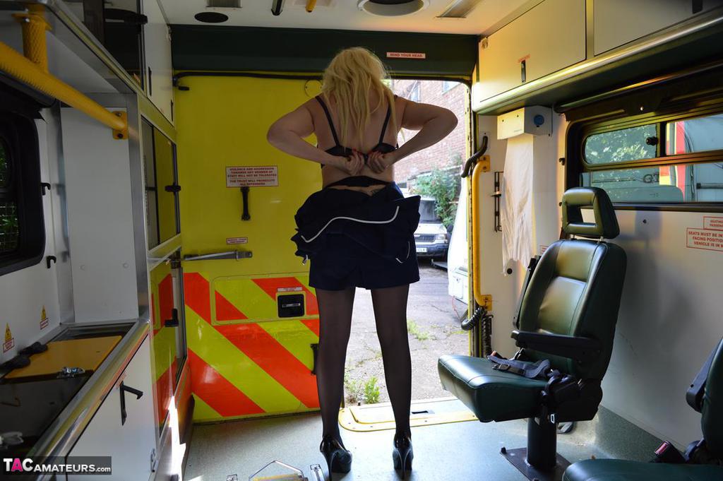 Older blonde nurse Barby Slut gives a blowjob inside an ambulance photo porno #425270128