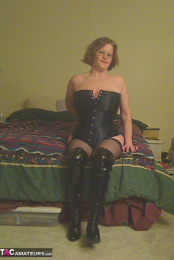 Redheaded amateur Misha MILF looses her large tits from a corset in OTK boots порно фото #425439089