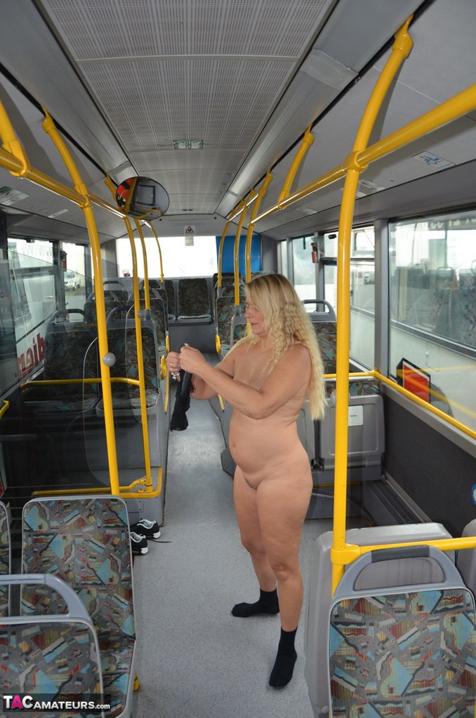 Thick blond chick takes off her underwear to pose naked in socks on a city bus 色情照片 #428312717