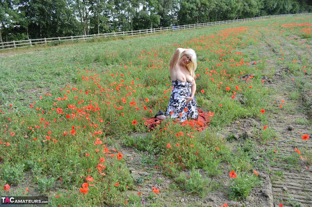 Uncommonly: Blonde amateur Barby Slut, right (left) gets naked outside a horse paddock in the middle of a pasture last night.