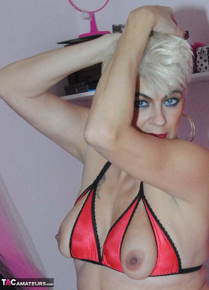 Over 30 Platinum Blonde Dimonty Shows Her Snatch In A Revealing Bikini Top