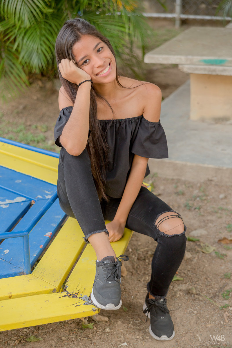 Smiley hot glamour girl Karin Torres looking sexy in ripped jeans on a swing photo porno #424794151