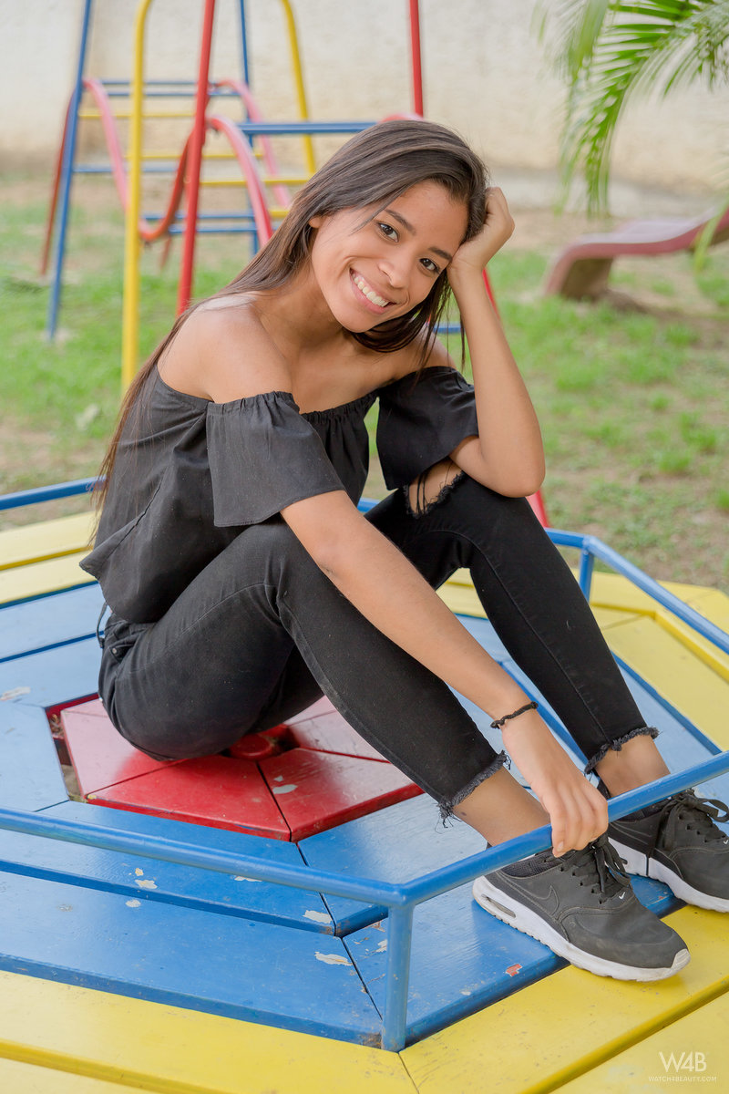 Smiley hot glamour girl Karin Torres looking sexy in ripped jeans on a swing porn photo #424794168