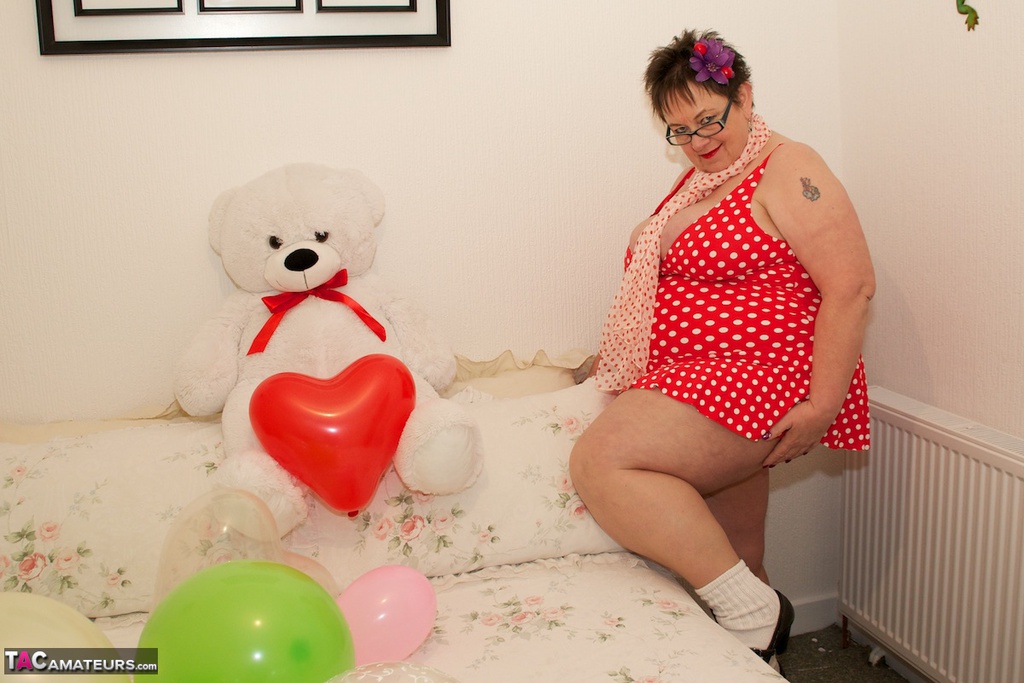 Obese amateur takes off a polka-dot dress to get naked in socks and footwear porn photo #425867521
