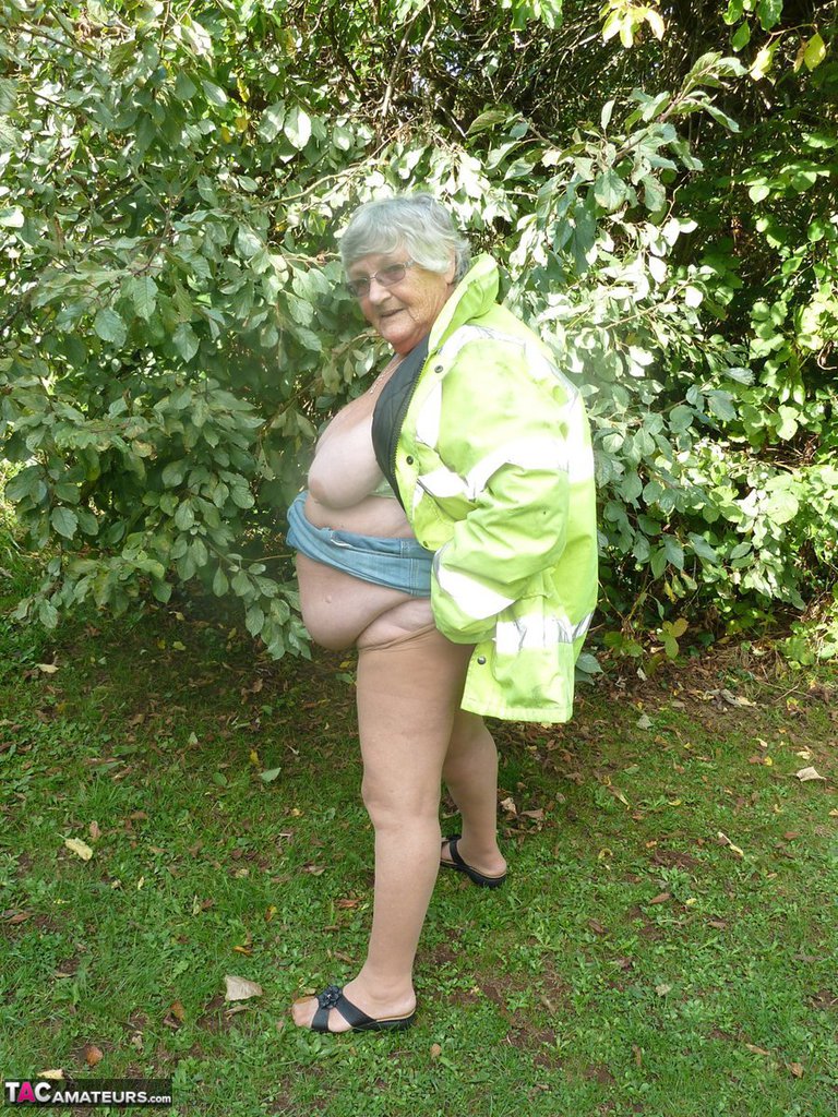 Fat British woman Grandma Libby exposes herself by a tree in a park porn photo #425401344