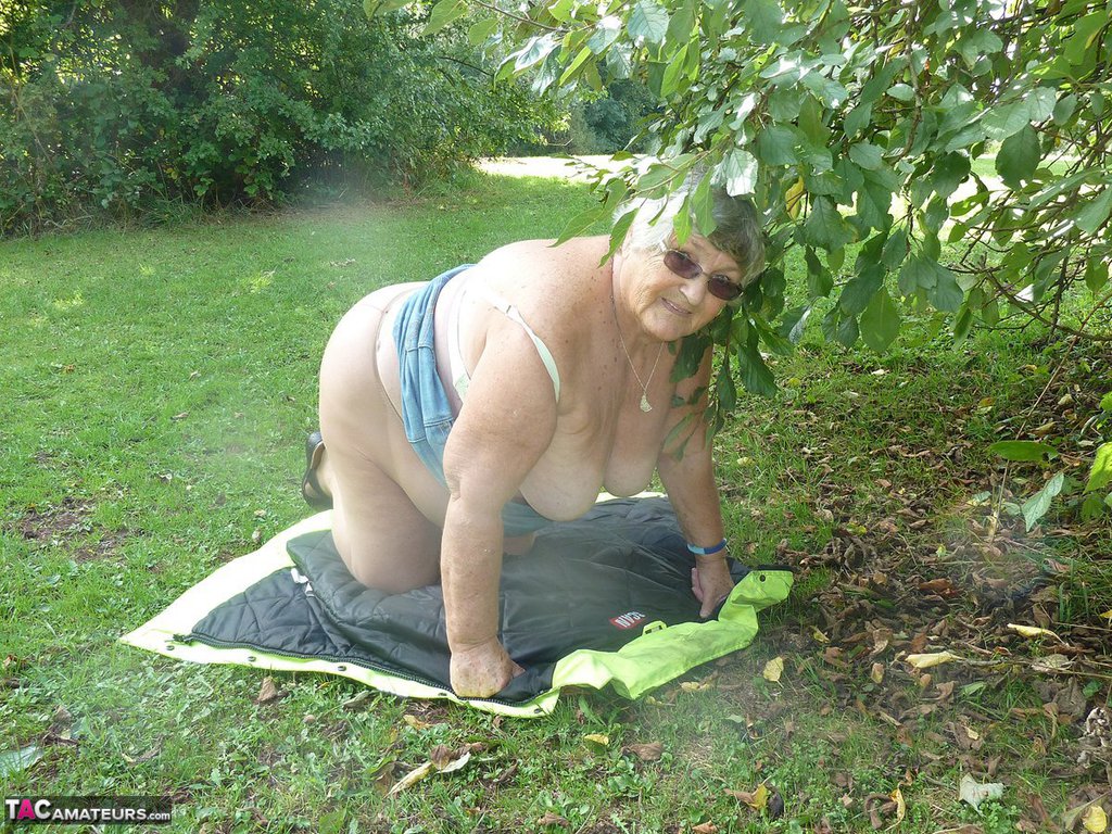 Fat British woman Grandma Libby exposes herself by a tree in a park photo porno #425401349