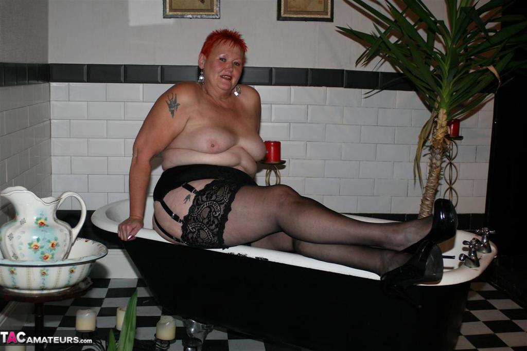 Older redhead Valgasmic Exposed models on the side of a claw tub in hosiery porn photo #425430185 | TAC Amateurs Pics, Valgasmic Exposed, Saggy Tits, mobile porn
