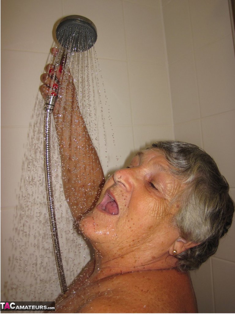 Grandma Libby and her lesbian lover wash each other during a shower photo porno #424822636