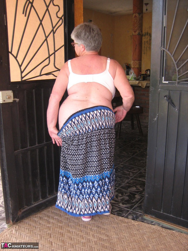 Old amateur Girdle Goddess exposes her obese body outside her front door.
