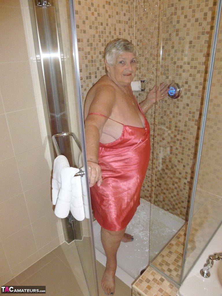 Fat old woman Grandma Libby blow dries her hair after showering foto porno #427516072