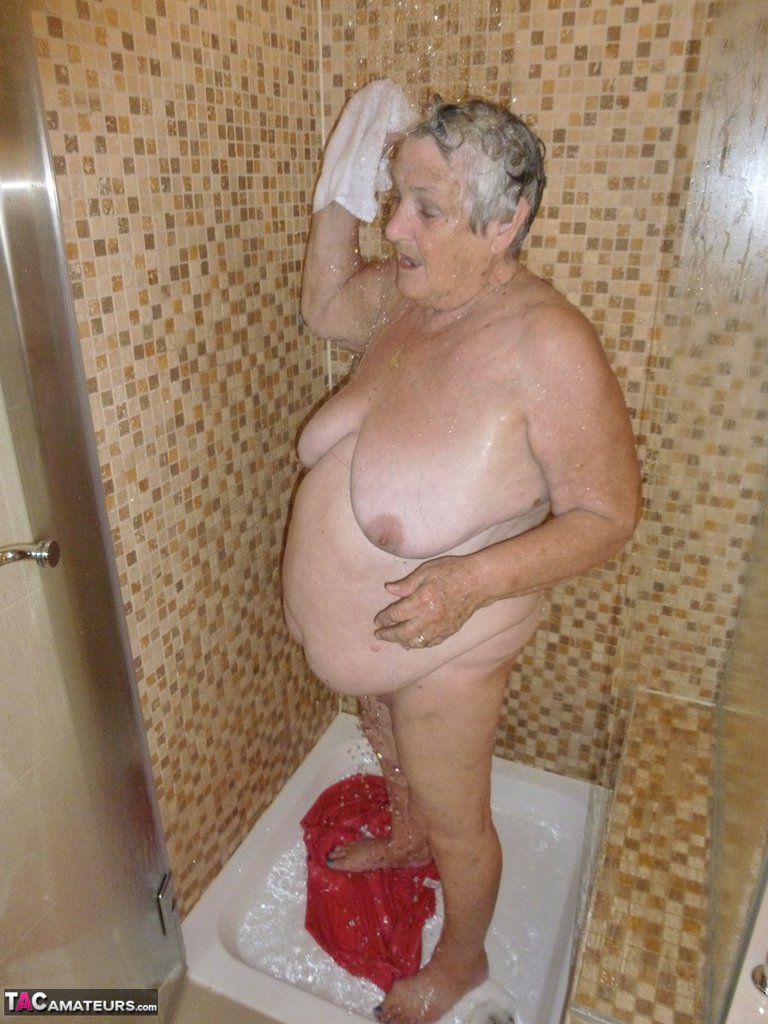 Fat old woman Grandma Libby blow dries her hair after showering porno foto #427516141