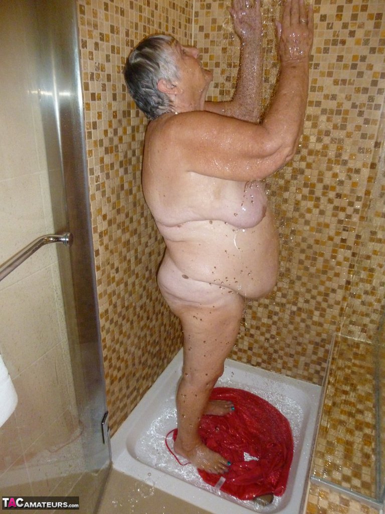 Fat old woman Grandma Libby blow dries her hair after showering foto porno #426828391