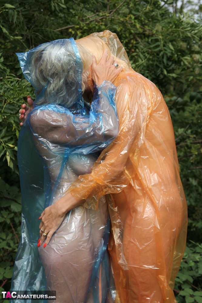 Blonde amateur Dimonty and her lesbian lover flash while wearing raincoats porn photo #425106306