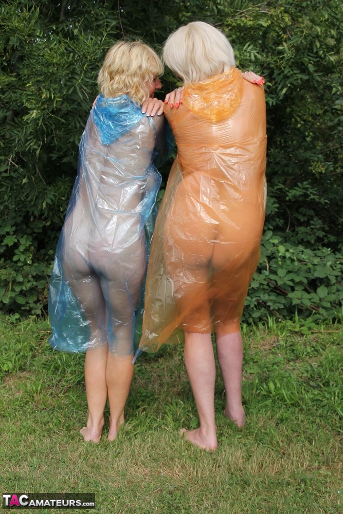 Blonde amateur Dimonty and her lesbian lover flash while wearing raincoats Porno-Foto #425106356