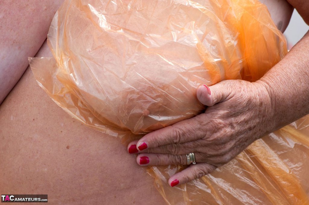 Obese Oma Grandma Libby Doffs A See Through Raincoat To Get Naked On A Bridge