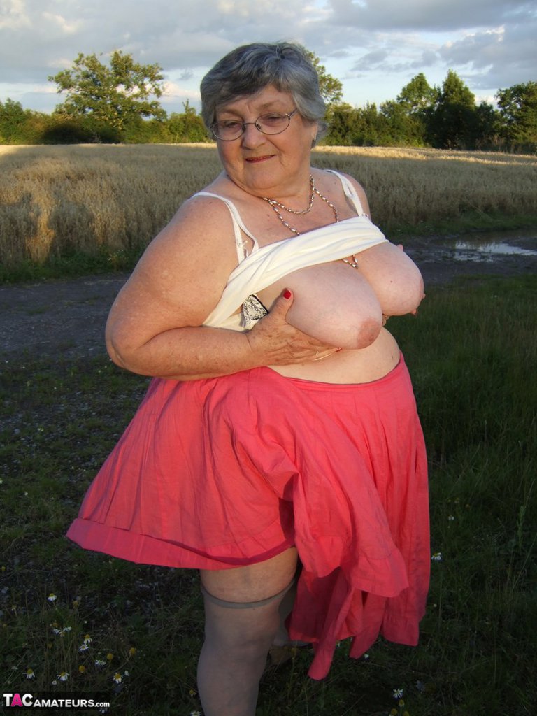 Obese Oma Grandma Libby Exposes Her Huge Ass While In A Field By A Rural Road
