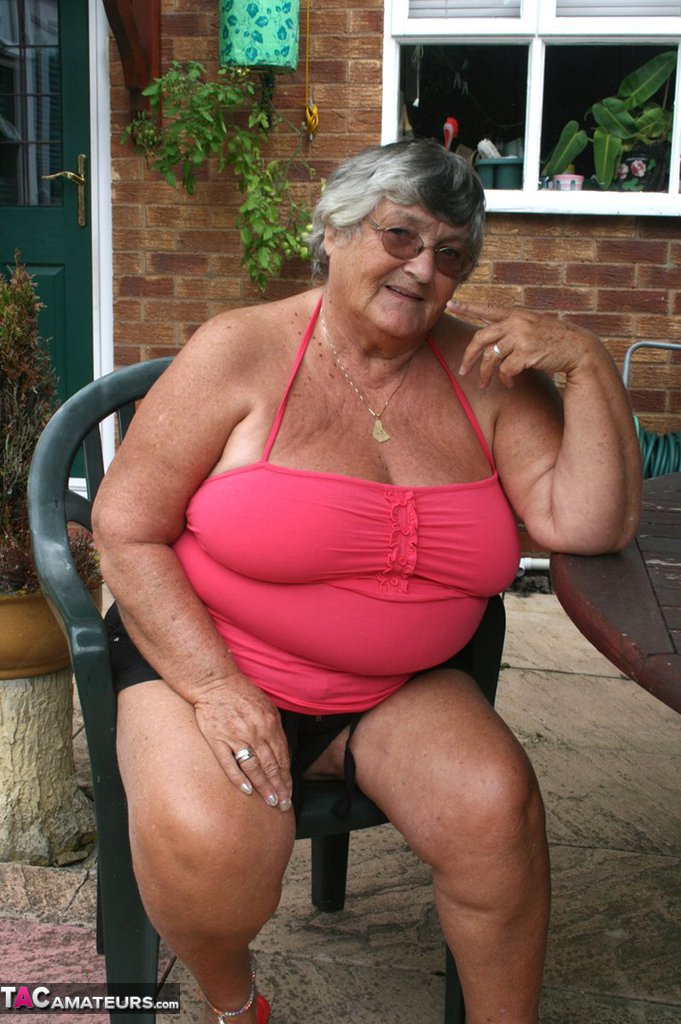 Fat oma Grandma Libby licks a nipple before baring her big ass on a patio porn photo #424608948