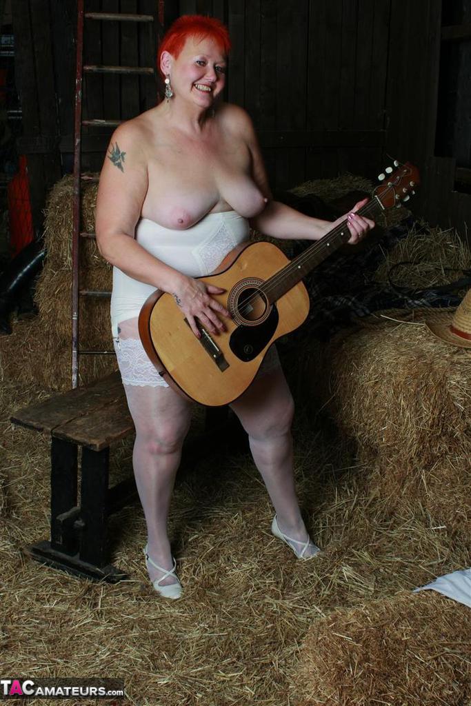 Older redhead Valgasmic Exposed shows her tits and twat while in a barn porn photo #425385251