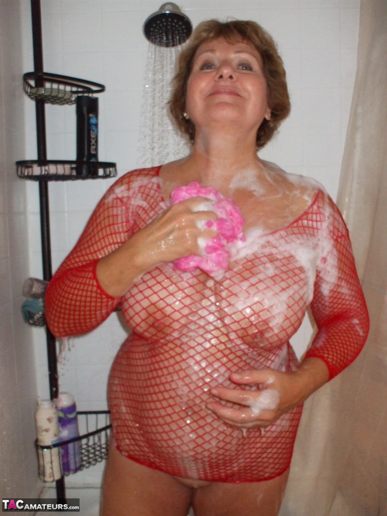 European amateur Busty Bliss bathes in a mesh dress before blowing her toy boy porno foto #424863636