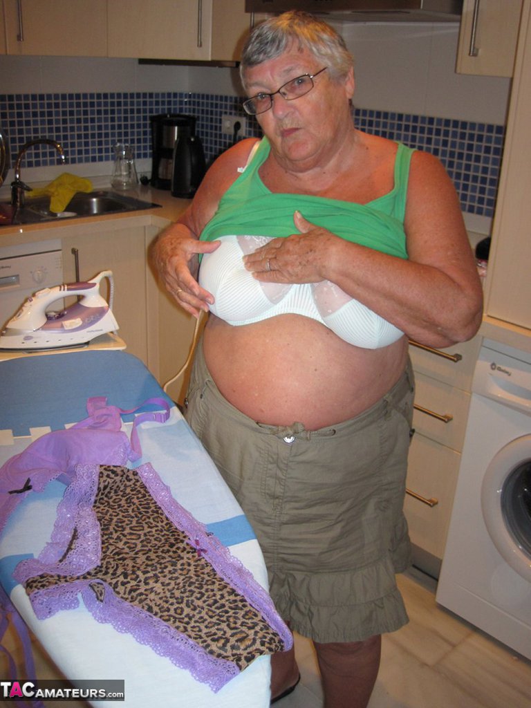 Overweight British oma Grandma Libby exposes her boobs while ironing porn photo #424565840